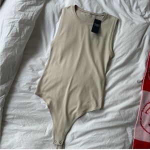 Abercrombie Soft Collection: Beige Nude Sleeveless Crewneck Bodysuit